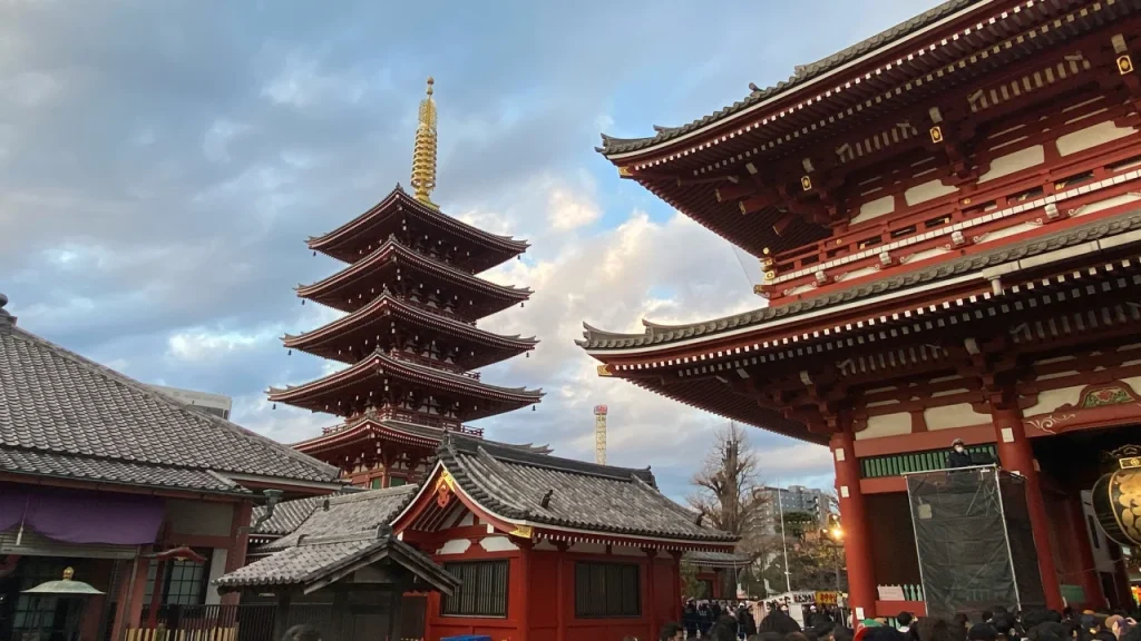 Senso-ji Temple in Asakusa, with its five-storey pagoda and main hall visible within the temple grounds.